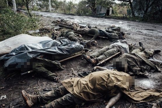 Heartbreaking images define the harsh realities of war in Ukraine - Photo: 3